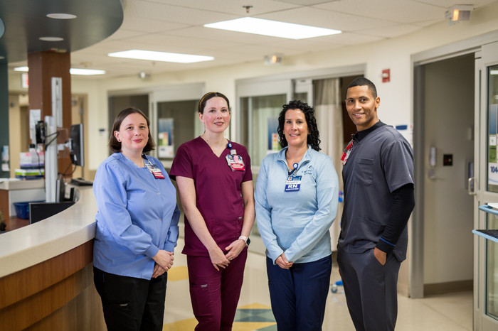Carilion clinicians in conversation at a nursing station