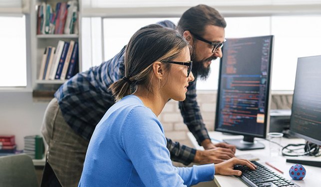 Analysts reviewing model output together