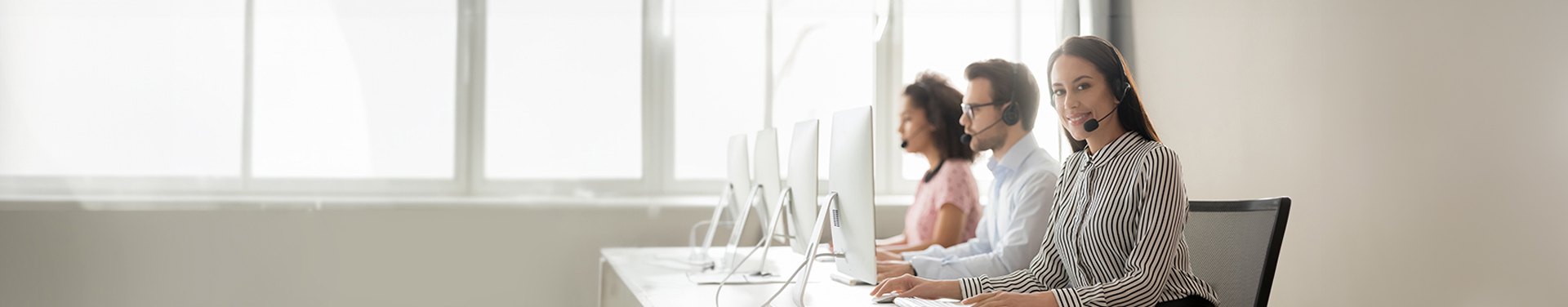 Claims professionals working a queue of calls