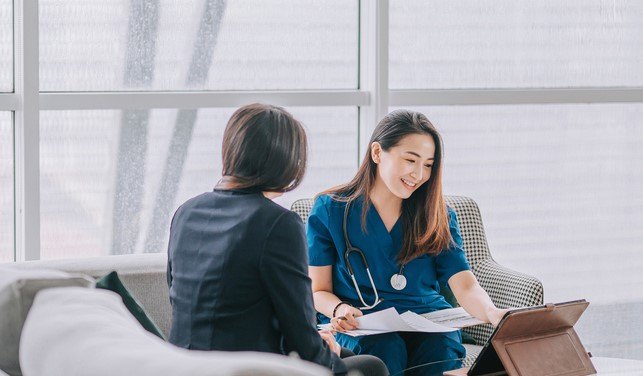 A nurse talking through a recovery plan